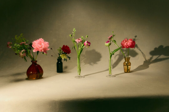 still life of flowers in vases
