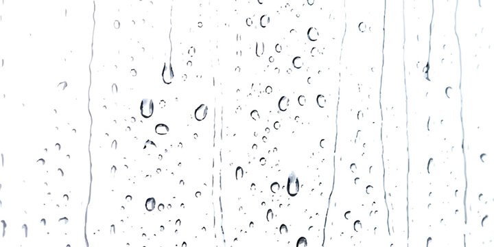 Rain drops running down on a clear glass window pane