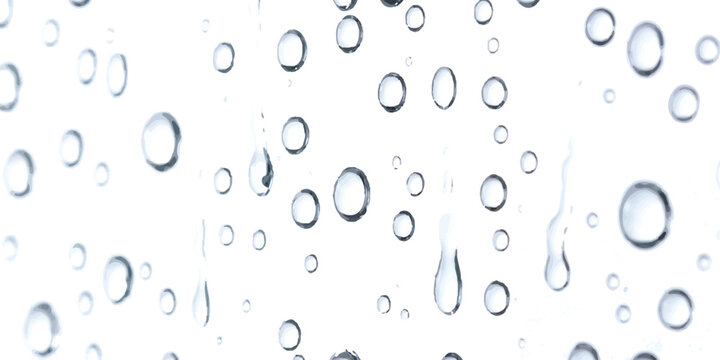 Clear water drops on a glass window pane after rain