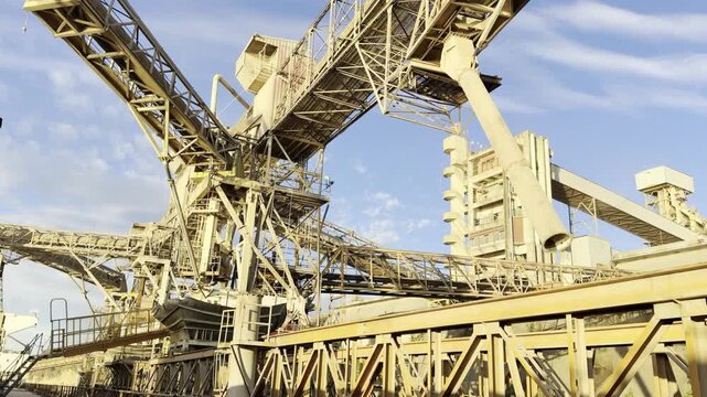 grain loading port construction. transportation belts and pipes, towers, bridges and berth for mooring.