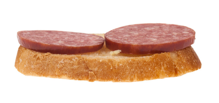 Sausage and bread isolated on a white background.
