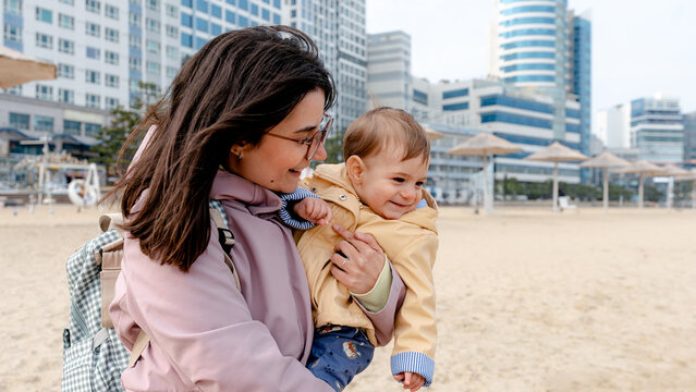 Mother and child enjoying Gwangalli Beach vibes