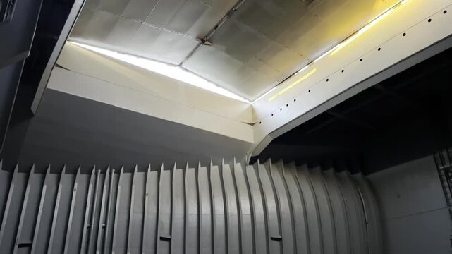 bulk carrier ship hatch covers of cargo hold opening. view from inside. empty cargo compartments of ocean going vessel before start loading.