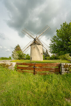 Traditional windmill in Montceau et Echarnant meadow