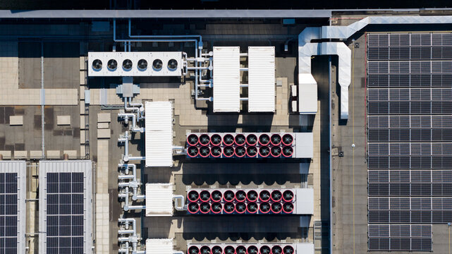 Aerial view of Interconnect Services BV featuring industrial HVAC cooling units and solar panels on the rooftop in 's-Hertogenbosch, Noord-Brabant, Netherlands.