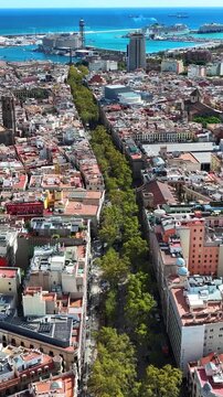La Rambla in Barcelona showing famous pedestrian street with people, shops and vibrant city life in Spain.