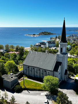 Top View of Resort Town Hanko (Hango) in Finland on the Shore of the Gulf of Finland of the Baltic Sea. Lutheran Church, Houses and Islands in Sunny Day. 