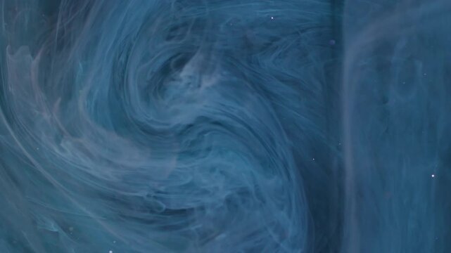 Paint haze. Swirl blue vapor. Defocused color glitter cloud splash sparkling liquid drop spreading on abstract art bokeh background.