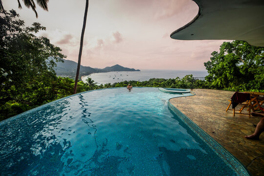 Infinity pool overlooking Koh Tao bay in summer, Thailand