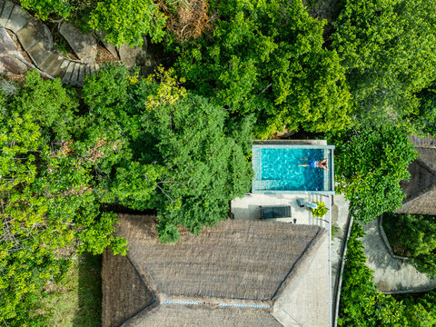 Aerial view of infinity pool villa in Koh Tao, Thailand