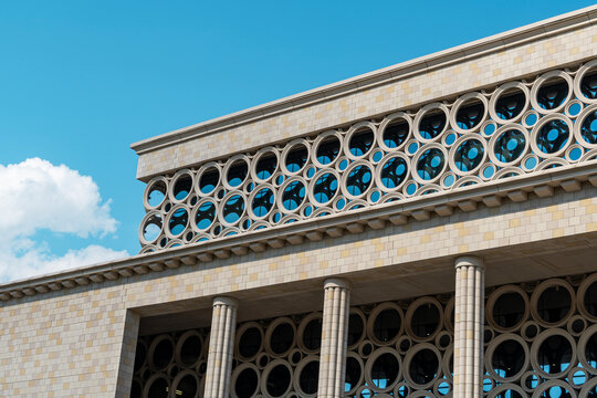 Modern building facade with repeating circular window frames