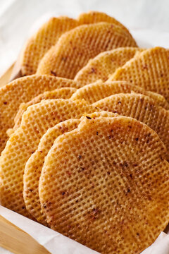 Dutch stroopwafel waffle stack close up on white tray