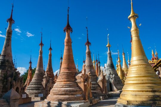 Ancient pagoda stupas at Indein in Myanmar under blue sky