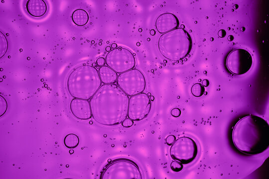 Abstract purple liquid bubbles macro texture background