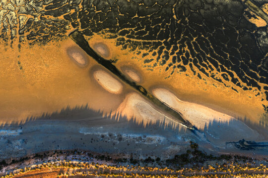 Abstract aerial view of colorful Spanish salt flats