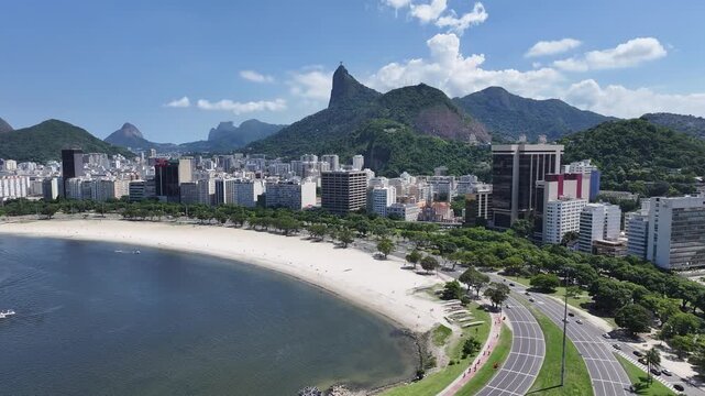Botafogo Beach In Rio De Janeiro Brazil. Turquoise Ocean Waves Gently Crashing On Tropical Beach. Landmark Town. District Skyline. Rio de Janeiro Brazil.
