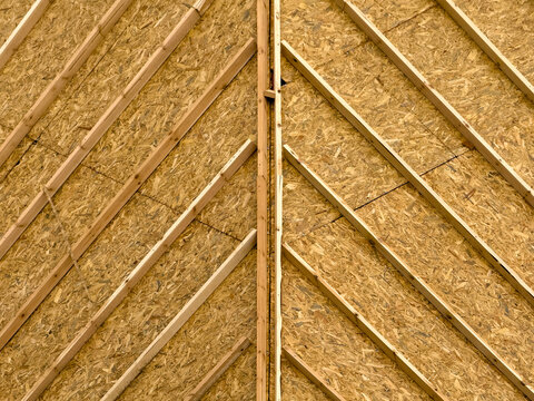 Roof construction detail with timber rafters and OSB sheathing