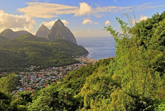 Tropical landscape with view of the village and the two Pitons, Gros Piton 770m and Petit Piton 743m, early morning sun, Soufriere, St. Lucia, Little Antilles, West Indian Islands, Caribbean Sea