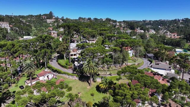 Winter Destination In Campos Do Jordao Sao Paulo Brazil. Drone Captures A Garden With Sidewalks Surrounded By Lush Trees. Cities Of The World. Landmark Downtown. Campos do Jordao Sao Paulo.