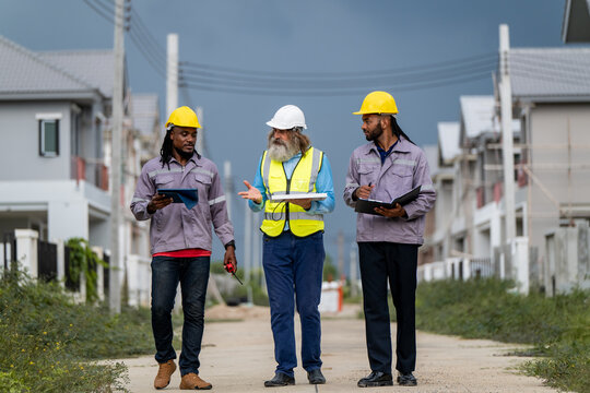 Engineers discussed preparation for installing small solar panels in residential village construction areas for sustainable energy projects and improving the landscape within the village project.