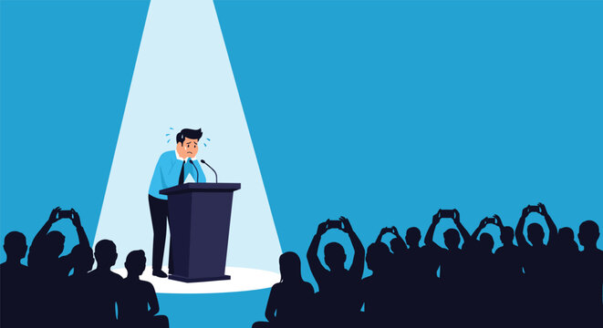 Nervous sweating man speaking at a podium under a spotlight while a dark crowd of people films him with phones.