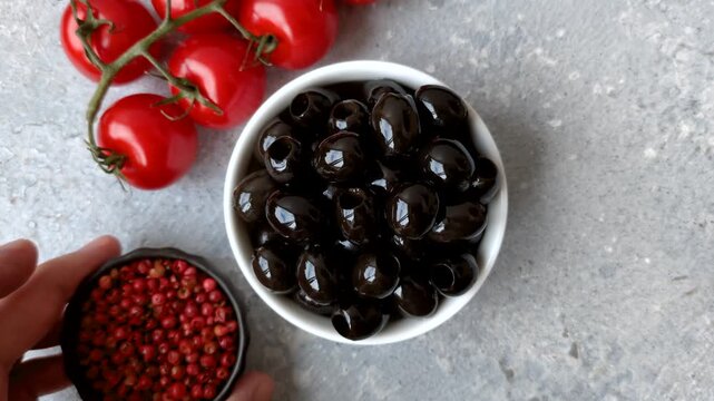 Black canned olives without pits for salads and snacks. Black olives without pits as a food background for your design