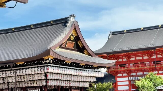 Traditional Japanese Shrine Rooflines and Rows of Paper Lanterns