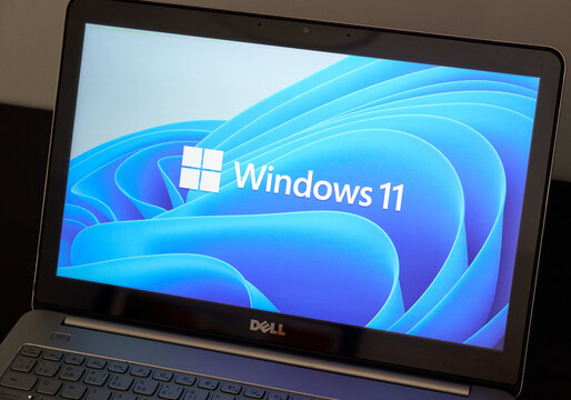 Laptop showing Windows 11 logo on display