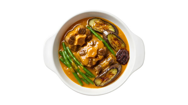 Kare Kare traditional Filipino rich oxtail and peanut stew with tender meat, eggplant, and green beans served in a white bowl isolated on a solid uniform white background