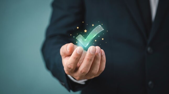 A businessman's hand presenting a glowing green checkmark, symbolizing success and approval in business and decision-making