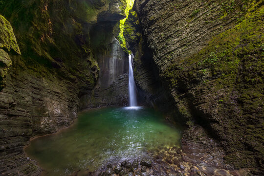 Slap Kozjak Waterfall in Slovenia Surrounded by Mossy Cliffs