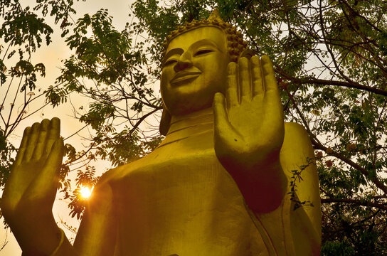 LUANG PRABANG LAOS: Buddha at Wat Tham Phousi shrine on mount Phousi. One of the best Luang Prabang Attractions.