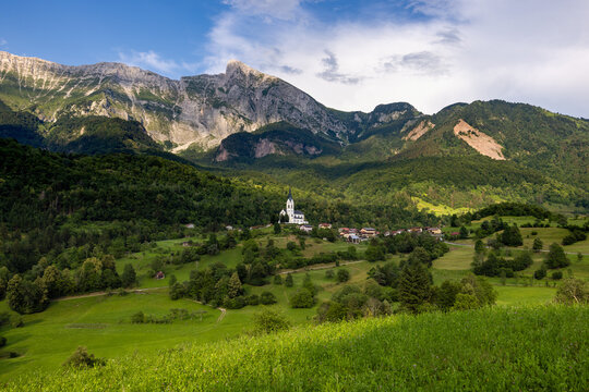 Church of Drežnica Surrounded by Green Pastures in Slovenia