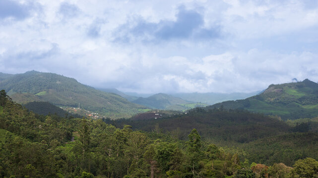 Panoramic View of Misty Hills and Lush Green Valleys in Munnar, Kerala, India
