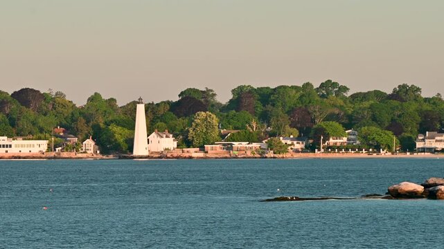 Groton, Connecticut, USA &ndash; Avery Point Lighthouse And Seagulls At Sunrise After Coastal Storm