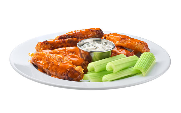 crunchy buffalo chicken wings with celery sticks and blue cheese dipping sauce in a plate isolated on a white background.