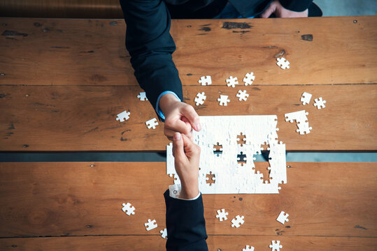 Unified synergy assembly business game implementation multiple puzzle meeting. Business connections strategy synergy team solution. Implement puzzle improve communication solve synergy organize team