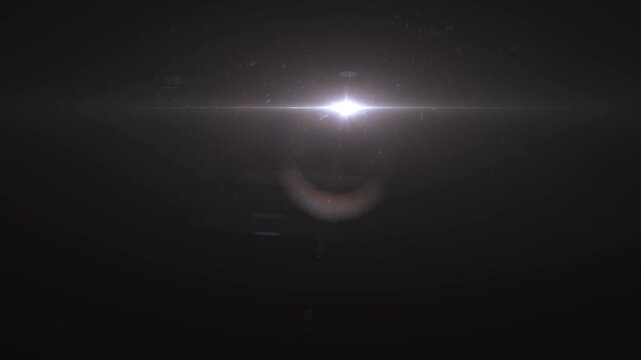 A bright light source in space with a partial lunar presence and a star-filled sky