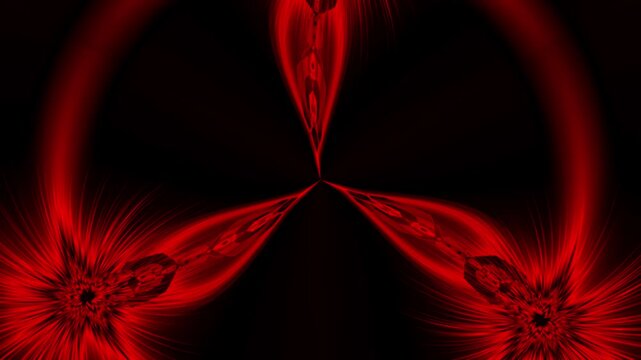 Swirling red patterns with a radiant burst effect on a dark background, creating a dynamic and energetic visual impression.