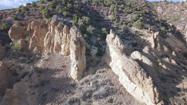Fruitland Area Uinta Mountains Push over Rock Formations with Junipers