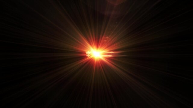 Vivid red light burst radiates sharp rays against a black backdrop