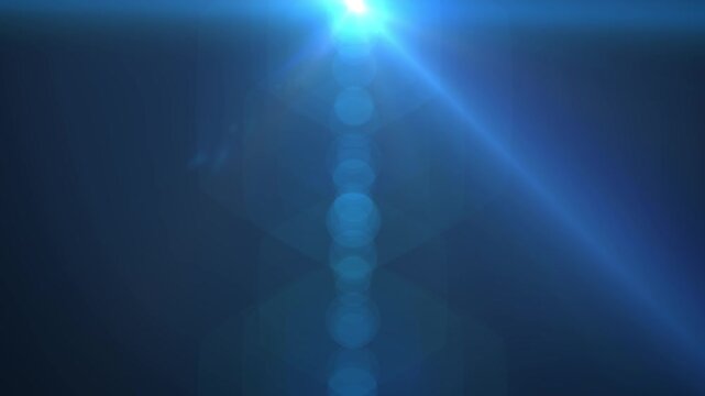 A vivid scene of bright sunlight with lens flare effects illuminating a clear blue sky