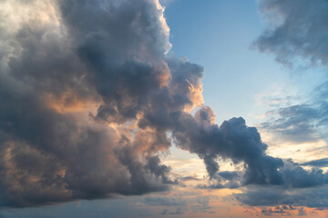Fototapeta premium Beautiful bright sunset with colorful dramatic clouds. Sky clouds background.