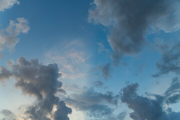 Fototapeta premium Beautiful bright sunset with colorful dramatic clouds. Sky clouds background.