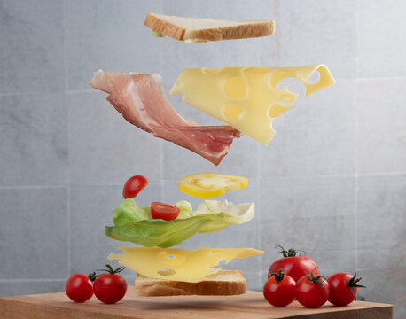 Between two slices of bread floating in the air, lettuce, cheese, and ham come together to form a sandwich. The background is light.