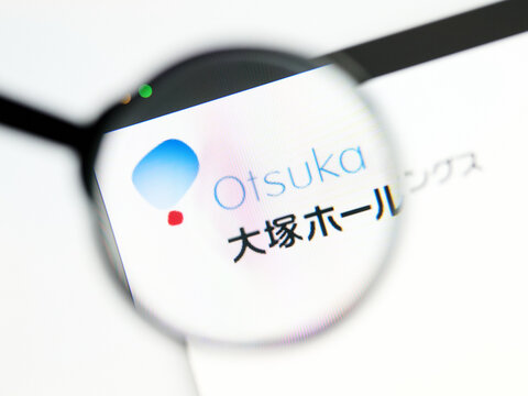 Milan, Italy 2026, 5 Jul Closeup of Otsuka Holding website page on a laptop screen. Focus on Otsuka Holding logo under a magnifying glass.