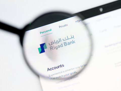 Milan, Italy 2026, 5 Jul Closeup of Riyad Bank website page on a laptop screen. Focus on Riyad Bank logo under a magnifying glass.