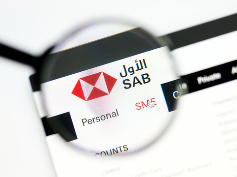 Milan, Italy 2026, 5 Jul Closeup of Saudi British Bank SAB website page on a laptop screen. Focus on Saudi British Bank SAB logo under a magnifying glass.