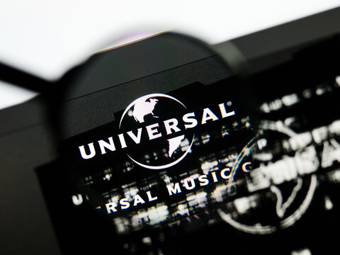 Milan, Italy 2026, 5 Jul Closeup of Universal Music Group website page on a laptop screen. Focus on Universal Music Group logo under a magnifying glass.