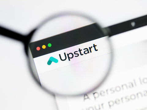 Milan, Italy 2026, 5 Jul Closeup of Upstart website page on a laptop screen. Focus on Upstart logo under a magnifying glass.